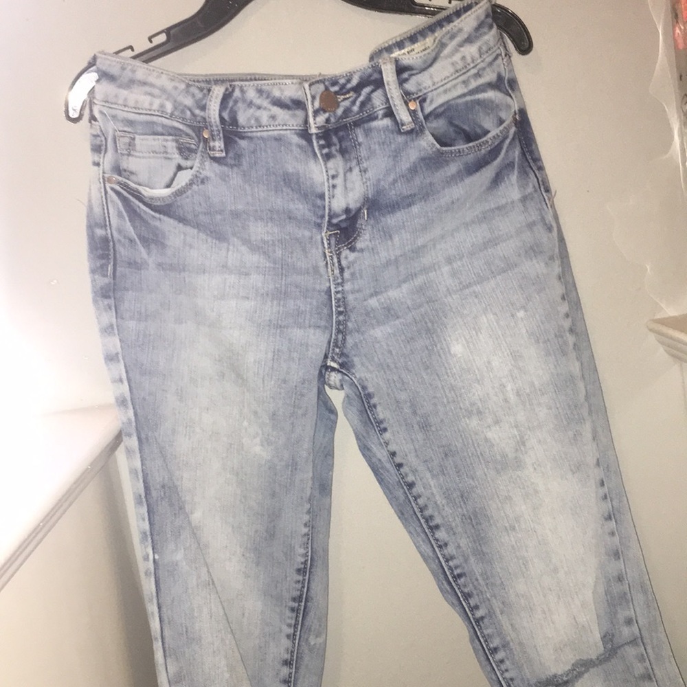Distressed acid washed jeans